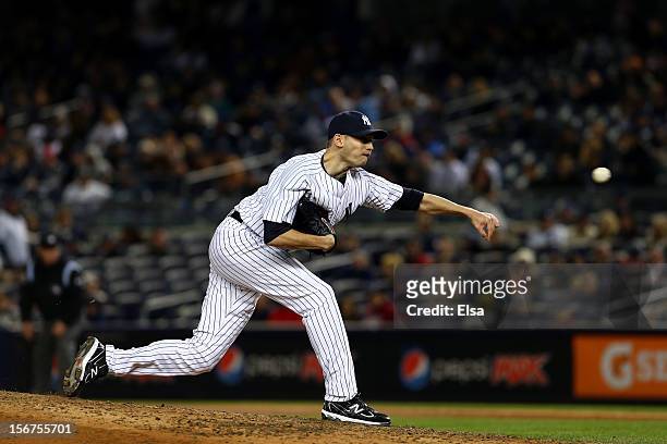Clay Rapada of the New York Yankees throws a pitch against the Detroit Tigers during Game One of the American League Championship Series at Yankee...