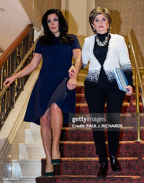 Attorney Gloria Allred and client Natalie Khawam, walk together to conduct a press conference November 20 at the Ritz-Carlton hotel in Washington,...