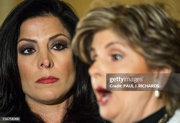 Attorney Gloria Allred and client Natalie Khawam conduct a press conference November 20 at the Ritz-Carlton hotel in Washington, DC. Khawam is the...