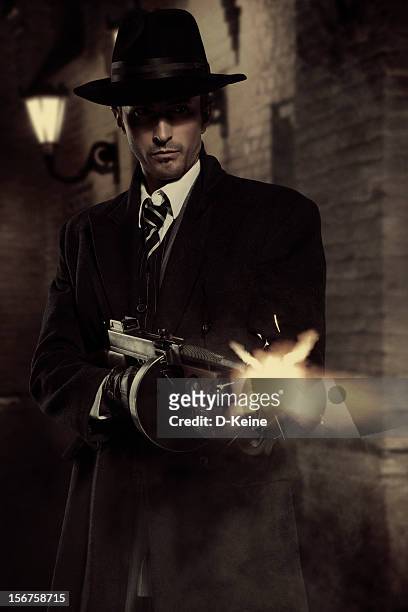 gangster - machine gun stock pictures, royalty-free photos & images