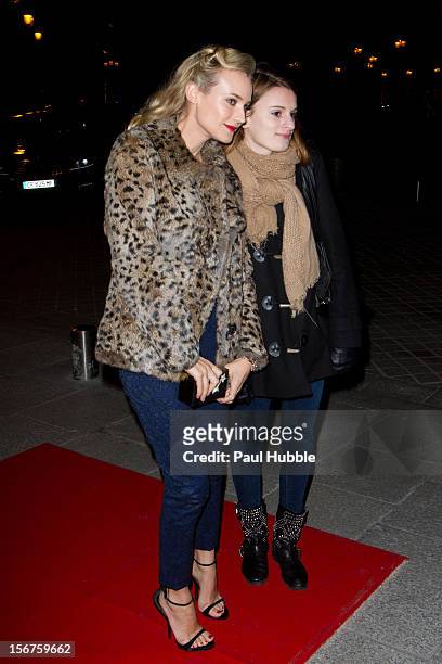 Actress Diane Kruger poses with a french fan as she is seen on the 'Place Vendome' on November 20, 2012 in Paris, France.