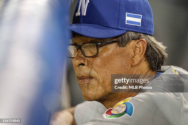 Dennis Martinez manager of Team Nicaragua looks on from the dugout during Game 4 of the Qualifying Round of the World Baseball Classic against Team...