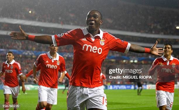 Benfica's Dutch midfielder Ola John celebrates after scoring a goal during the UEFA Champions League football match SL Benfica vs Celtic FC at the...