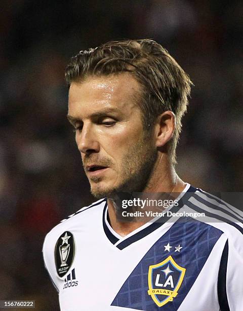 David Beckham of the Los Angeles Galaxy jogs toward the corner to take a corner kick during Leg 1 of the Western Conference Championship against the...