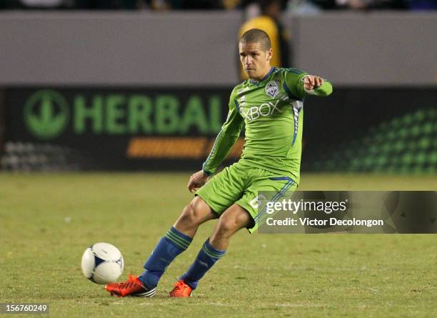 Osvaldo Alonso of the Seattle Sounders chips a pass during Leg 1 of the Western Conference Championship against the Los Angeles Galaxy at The Home...