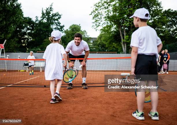 Mischa Zverev is seen at a Kids Camp as part of the Alexander Zverev Foundation during day three of the Hamburg European Open 2023 at Rothenbaum on...