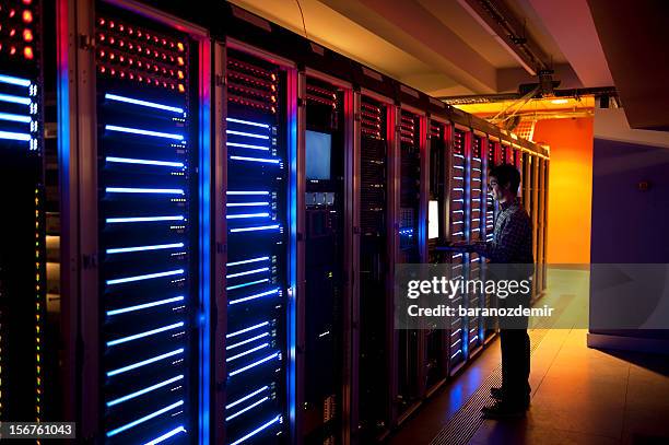 it engineer in action configuring servers - old computer equipment stock pictures, royalty-free photos & images