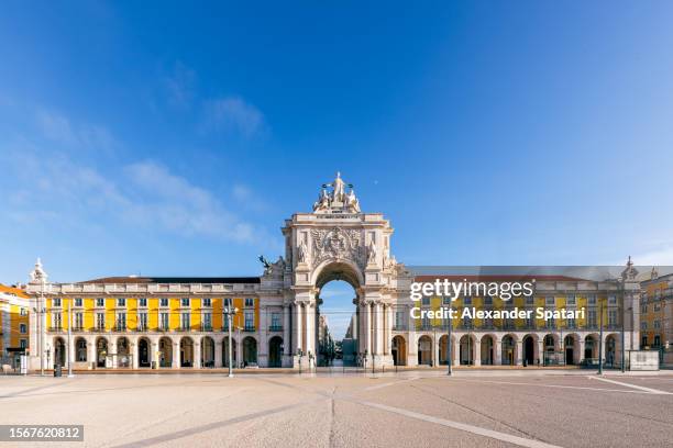 praca do comerco square and rua augusta arch in lisbon, portugal - lisbon portugal stock pictures, royalty-free photos & images