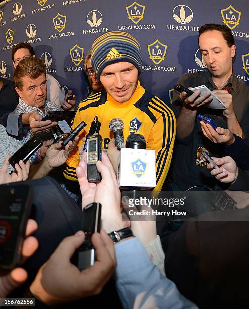 David Beckham of England speaks to reporters after announcing his departure from the Galaxy as a player after the MLS Cup at The Home Depot Center on...