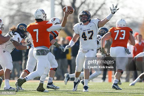 Matt Schilz of the Bowling Green Falcons throws the ball past Mark Fackler of the Kent State Golden Flashses on November 17, 2012 at Doyt Perry...