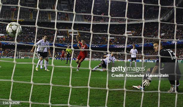 Thomas Mueller of Bayern Muenchenscores the first team goal during the UEFA Champions League group F match between Valencia FC and FC Bayern Muenchen...