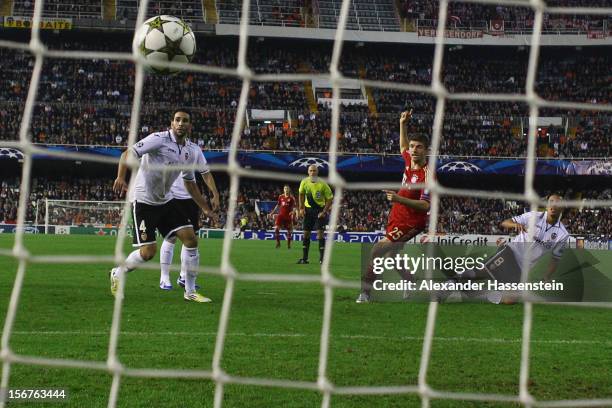 Thomas Mueller of Bayern Muenchenscores the first team goal during the UEFA Champions League group F match between Valencia FC and FC Bayern Muenchen...