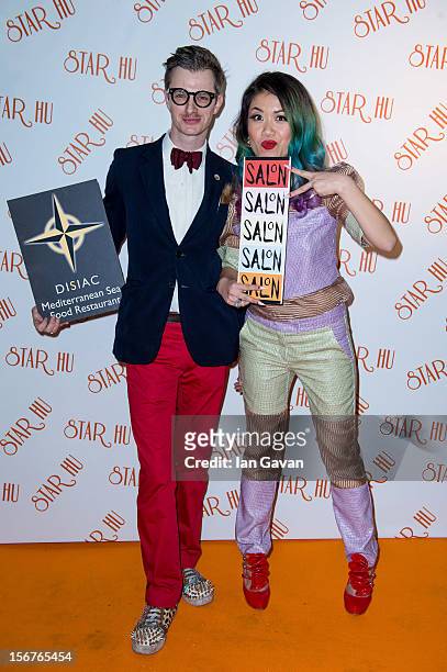 Luke Laffelle and Star Hu attend the Star Hu store launch party on November 20, 2012 in London, United Kingdom.