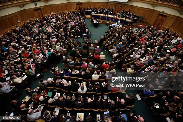 General view of members voting on handsets to decide whether to give final approval to legislation introducing the first women bishops, during a...