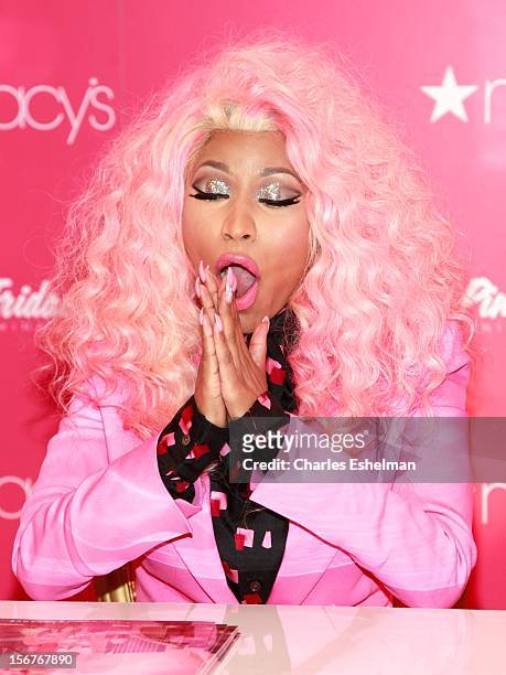Singer Nicki Minaj introduces "Pink Friday" Fragrance Holiday Season Celebration at Macy's Queens Center on November 20, 2012 in the Queens borough...