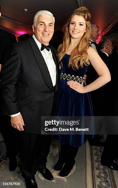 Mitch Winehouse and Ella Henderson attend a drinks reception at the Amy Winehouse Foundation Ball held at The Dorchester on November 20, 2012 in...