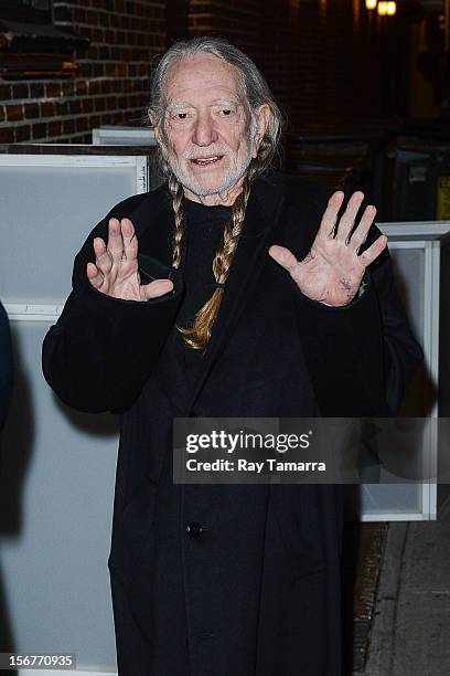 Singer Willie Nelson enters the "Late Show With David Letterman" taping at the Ed Sullivan Theater on November 20, 2012 in New York City.