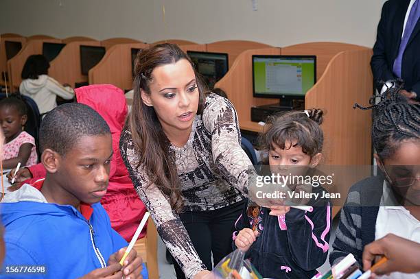 Adrienne Bosh with husband Chris Bosh and Team Tomorrow Inc. Team up for the 2nd year with Chapman Partnership to feed the local families of Miami...