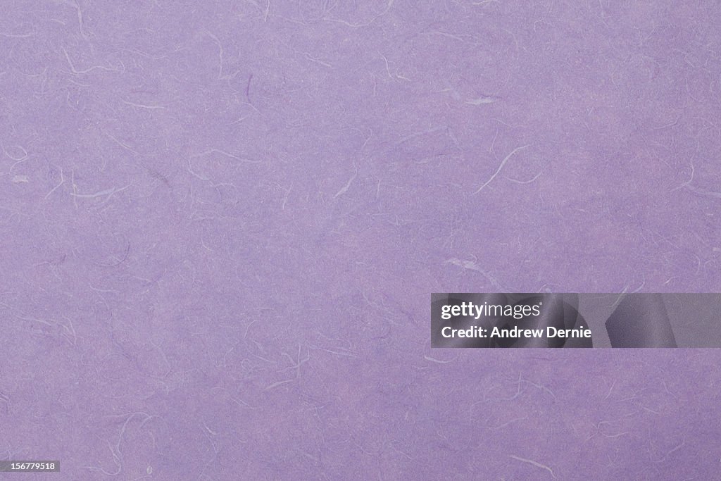 Purple hand made paper background