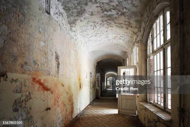 corridor in an abandoned building - ghost town stock pictures, royalty-free photos & images