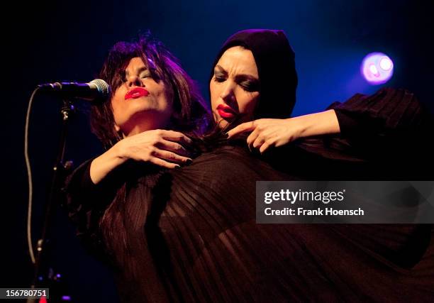 Singer Liset Alea and Zula Zazou of Nouvelle Vague performs live during a concert at the C-Club on November 20, 2012 in Berlin, Germany.