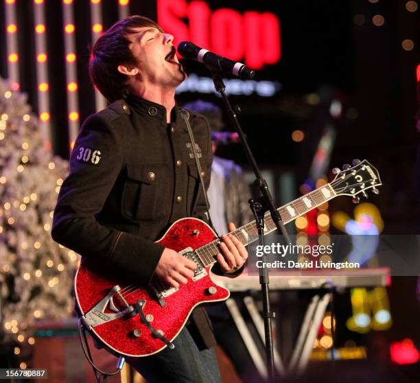 Singer Drake Bell performs on stage at Associated Television International's 2012 Hollywood Christmas Parade Concert at Universal CityWalk's 5 Towers...