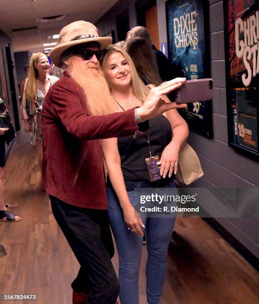 Billy Gibbons of ZZ Top with wife Gillian Stillwater backstage at Ameris Bank Amphitheatre on July 23 in Alpharetta, Georgia.