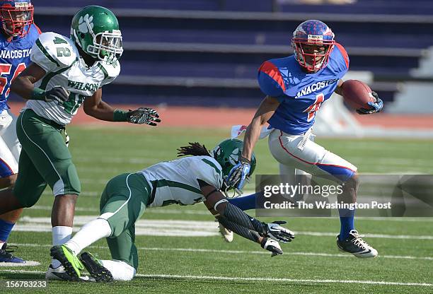 Anacostia WR Don'Tae Lee breaks free for etra yards during 1st half action against Wilson during the DCIAA football semifinals on November. 10, 2012...