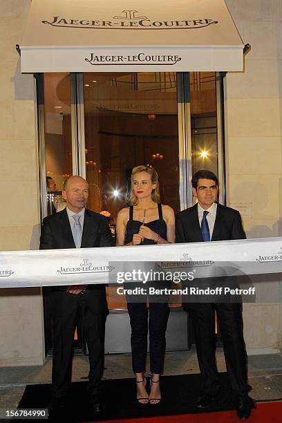 Diane Kruger , Guillain Maspetiol, Director General France of Jaeger-LeCoultre and Jerome Lambert, CEO of Jaeger-LeCoultre, prepare to cut the ribbon...