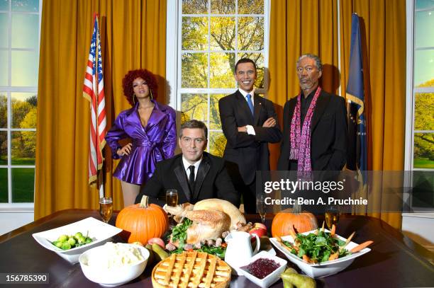 Madame Tussauds London marks US President Barrack Obama's fourth Thanksgiving in office with a grouping of his waxwork figures alongside waxworks of...