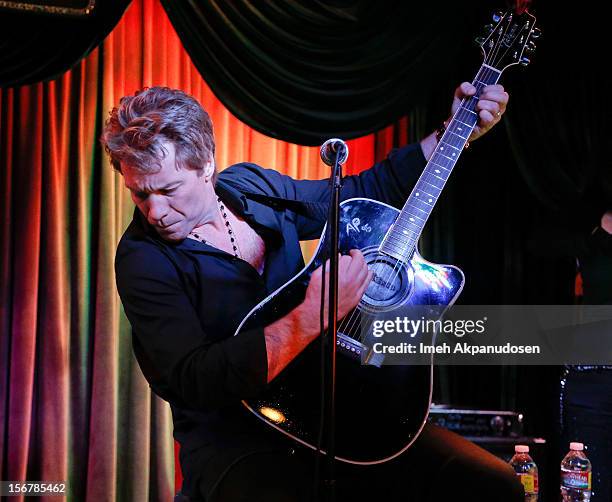 Musician Jon Bon Jovi performs onstage at Lakeshore Records Soundtrack Release Party For 'Stand Up Guys' at The Mint on November 20, 2012 in Los...