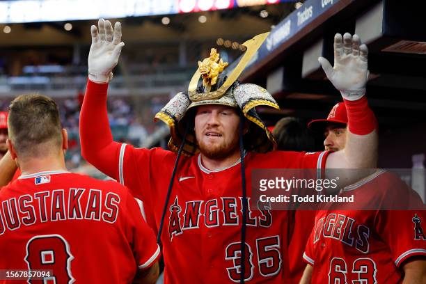 Chad Wallach of the Los Angeles Angels reacts after hitting a home run during the sixth inning against the Atlanta Braves at Truist Park on July 31,...