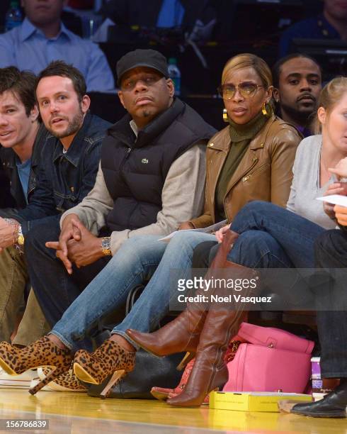 Mary J. Blige and Martin Kendu Isaacs attend a basketball game between the Brooklyn Nets and the Los Angeles Lakers at Staples Center on November 20,...