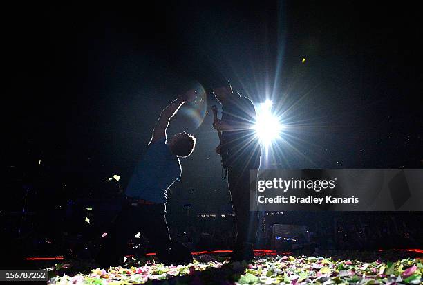 Chris Martin of Coldplay performs live for fans at Suncorp Stadium on November 21, 2012 in Brisbane, Australia.