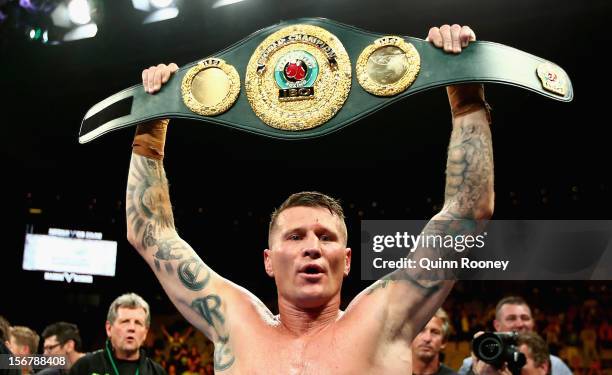 Danny Green of Australia celebrates with the belt after winning the world title bout between Danny Green of Australia and Shane Cameron of New...