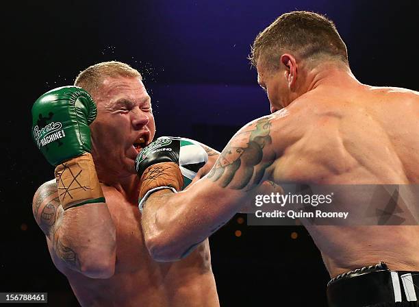 Danny Green of Australia lands a punch to Shane Cameron of New Zealand during their world title bout at Hisense Arena on November 21, 2012 in...