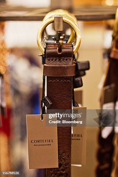 Brand tags hang from leather belts on display inside a Cortefiel SA store in Majadahonda, near Madrid, Spain, on Tuesday, Nov. 20, 2012. Bank of...