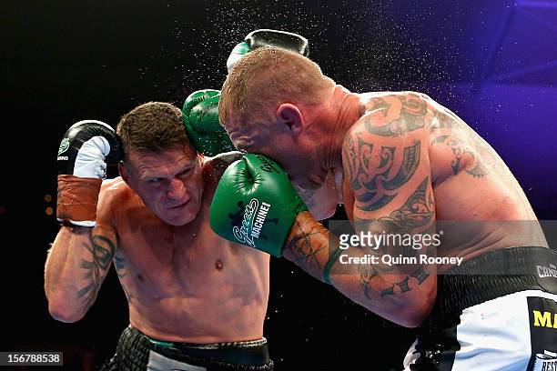 Danny Green of Australia and Shane Cameron of New Zealand exchange blows during their world title bout at Hisense Arena on November 21, 2012 in...