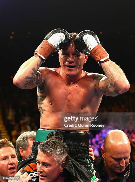 Danny Green of Australia celebrates winning the world title bout between Danny Green of Australia and Shane Cameron of New Zealand at Hisense Arena...