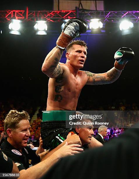 Danny Green of Australia celebrates winning the world title bout between Danny Green of Australia and Shane Cameron of New Zealand at Hisense Arena...