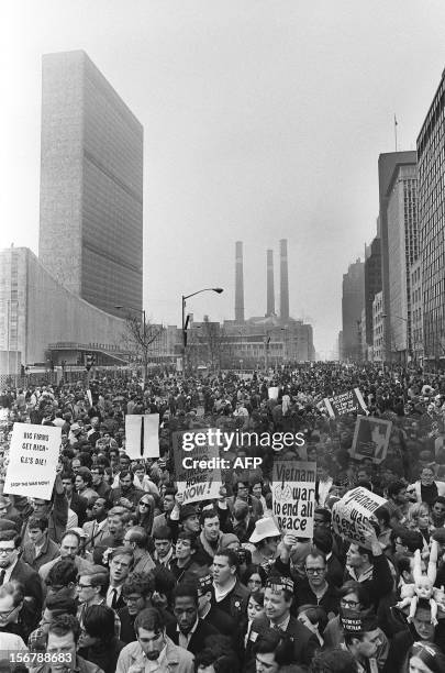 Anti-war demonstrators march outside United Nations headquarters, on April 16, 1967 in New-York, to protest against war in Vietnam.