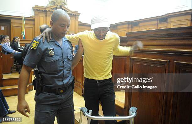 Xolile Mngeni in the Cape Town High Court on November 21, 2012 in Cape Town, South Africa. Mngeni was found guilty of robbery with aggravating...