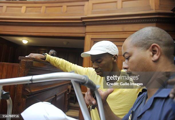 Xolile Mngeni in the Cape Town High Court on November 21, 2012 in Cape Town, South Africa. Mngeni was found guilty of robbery with aggravating...