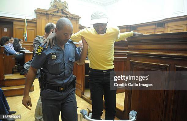 Xolile Mngeni in the Cape Town High Court on November 21, 2012 in Cape Town, South Africa. Mngeni was found guilty of robbery with aggravating...