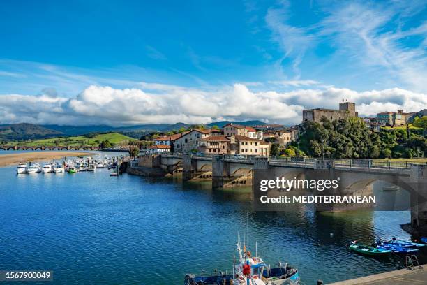 san vicente de la barquera in cantabria picturesque village with boats spain - san vicente de la barquera stock pictures, royalty-free photos & images