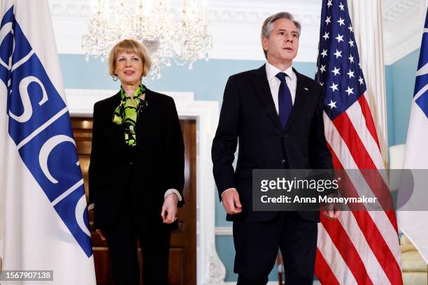 Secretary of State Antony Blinken and OSCE Secretary General Helga Maria Schmid arrive to give remarks to reporters at the State Department on July...