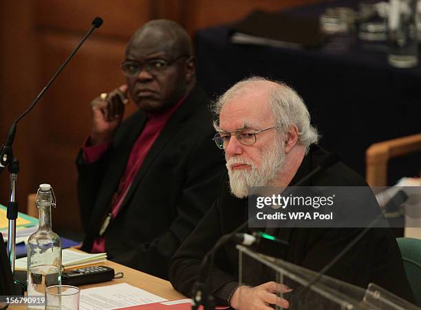 Dr John Sentamu, Archbishop of York and Dr Rowan Williams, the outgoing Archbishop of Canterbury, listen to a debate about the living wage during a...