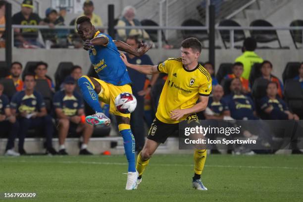 Julian Quinones of America controls the ball while Sean Zawadzki of Columbus Crew defends during the second half of the Leagues Cup group stage match...