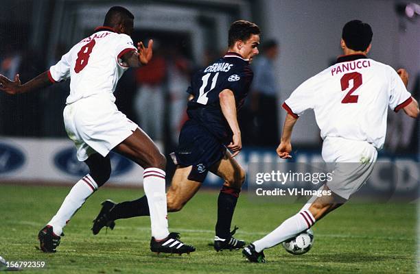 Marc Desailly of AC Milan, Marc Overmars of Ajax, Christian Panucci during the Champions League final match between Ajax Amsterdam and AC Milan on...