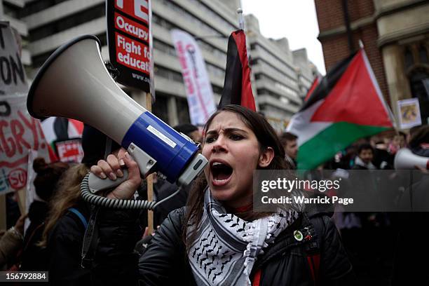 Protesters gather to demonstrate against education cuts, tuition increases and austerity on November 21, 2012 in London, England. The demonstration...